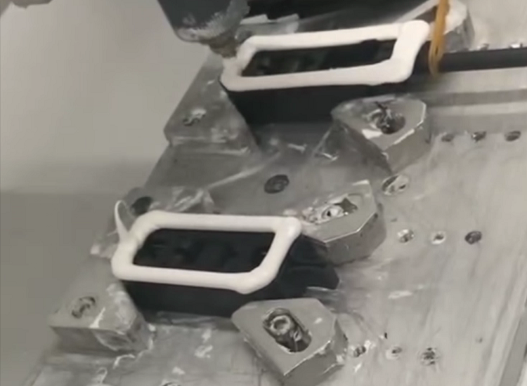 PV module junction box sealant application